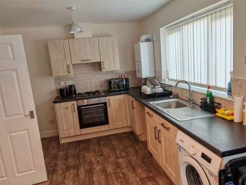 Spacious kitchen and dining area for relaxed meals and morning coffee.