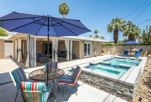 Private pool and spa surrounded by desert landscaping