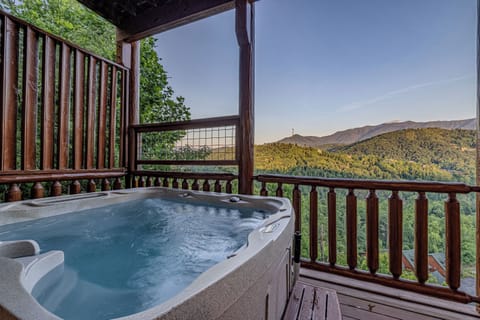 Relax in the 7-person hot tub while soaking in the amazing views