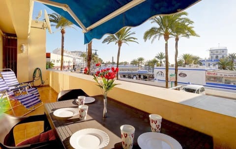 Large and sunny terrace with views to the marina and the sea