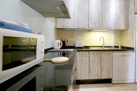 Another picture of the modern kitchen from the dining area