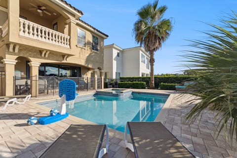 Sun-drenched swimming pool, perfect for relaxing, swimming, and soaking up the Florida sunshine.