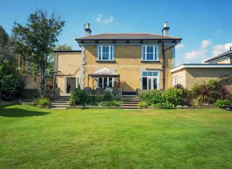 Back of property and enclosed garden