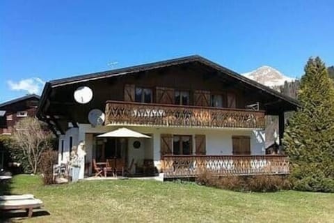 Chalet seen from garden in summer