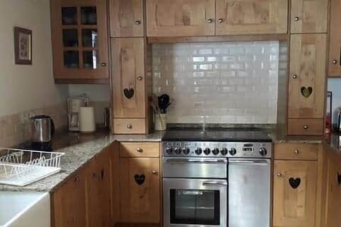 Kitchen with range-style cooker