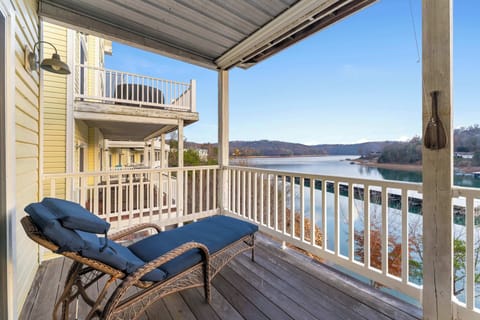 Unwind on your private deck with stunning lake views and serene nature.