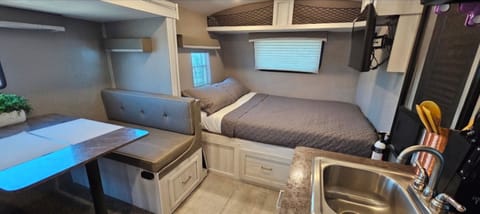Spacious comfortable, living area filled with natural light.