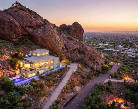 Set atop Camelback Mountain, this 5,579 sqft tri-level home offers the ultimate in privacy and panoramic views of all of Paradise Valley. A truly exceptional location.