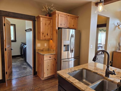 View from Kitchen to Master Bedroom and Laundry Room