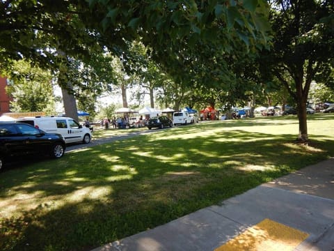 I/2 block from the house is the park.  This is Friday so the Farmer's Market is on:0