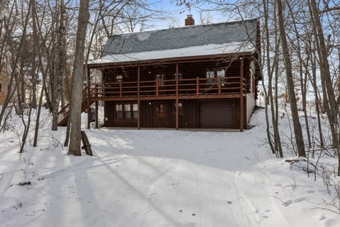 Classic log craftsmanship and a welcoming porch set the tone the moment you arrive. Beautifully designed for modern travelers, the home also features a dedicated electric vehicle charger. You can settle in, plug in, and enjoy the stay!