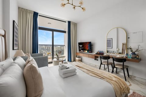 Cozy and neatly made bed with soft bedding for a relaxing stay.