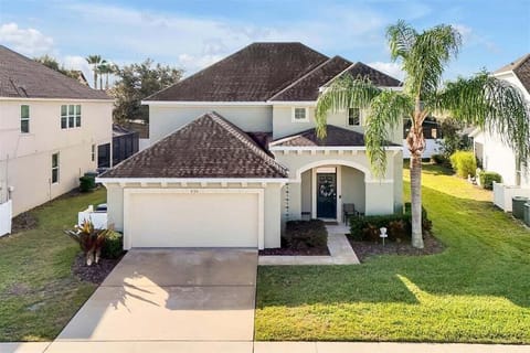 A stunning two-story sanctuary in a premier gated community, perfectly located just minutes from Disney World and top Orlando attractions.