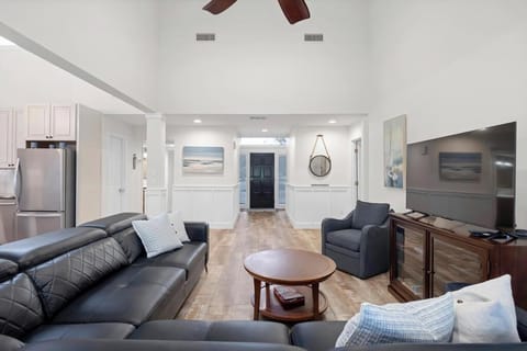 Cozy lounge setup w/ plush seating for movie nights or quiet evenings.