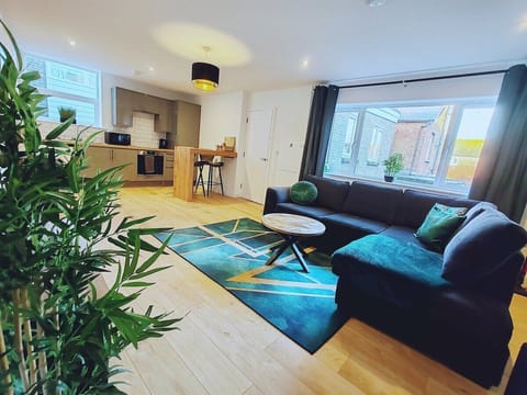 Stretch out and relax on the spacious corner sofa 