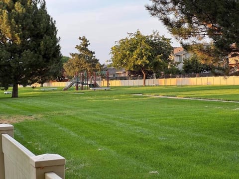 Walking trails directly behind the home — perfect for morning strolls. With a park for the kids. Plenty of space to run around and play games.