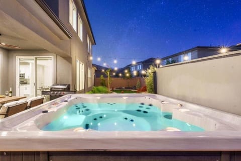 8 person hot tub under the perfect mood lighting.