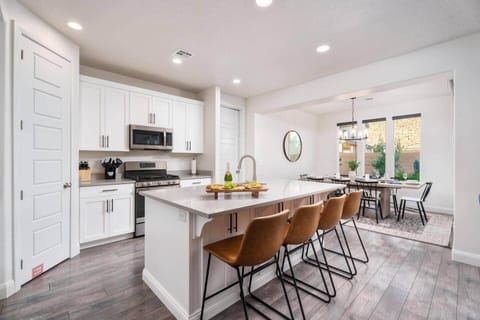 Fully stocked kitchen with plenty of dishes, a Keurig and drip coffee maker, kids’ dishes, and ample seating—everything you need for easy meals and family gatherings.