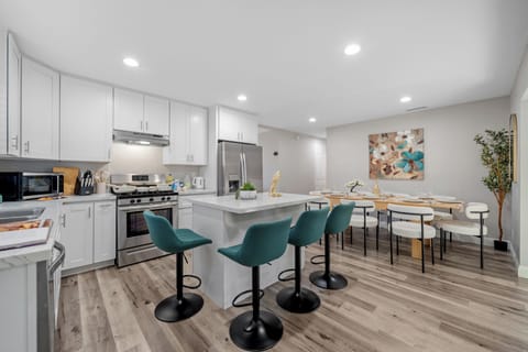 Bright kitchen island adding style and function to the space.