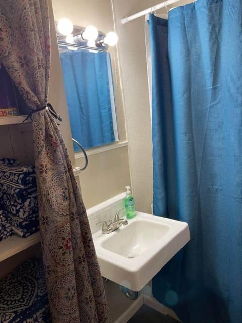 Bathroom with full tub and shower. 