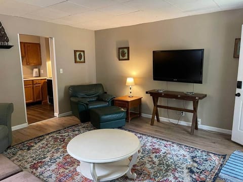 Living room leading into kitchen. 