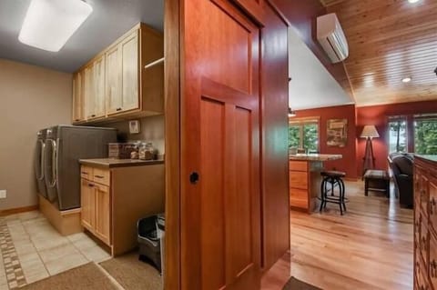 Convenient Laundry Room with Full-Size Washer and Dryer