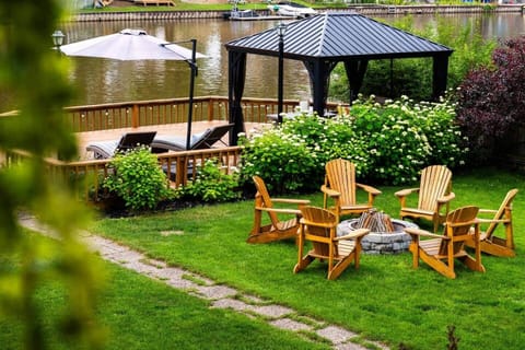 Nestled within nature's embrace, the gazebo provides a tranquil haven to sit and savor the gentle dance of the river. 