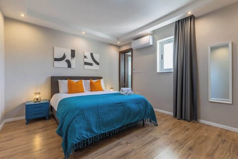 Revel in the spacious master bedroom with its own ensuite bathroom, equipped with blackout blinds and fully air conditioned for your comfort.