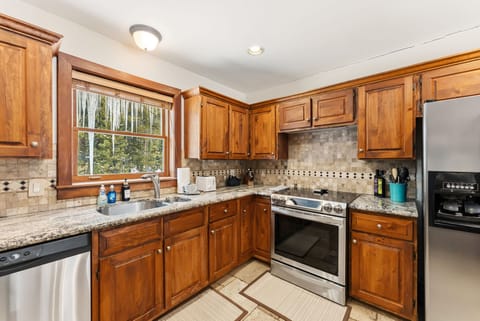 Kitchen: Drip coffee maker, Keurig, air fryer, blender, waffle maker, toaster, cooking utensils, tableware