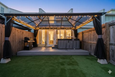 Enjoy night bonding with your loved one hereat backyard with our hot-tubandgrill