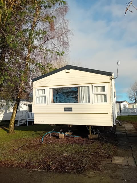 Cozy mobile home retreat with peaceful outdoor views