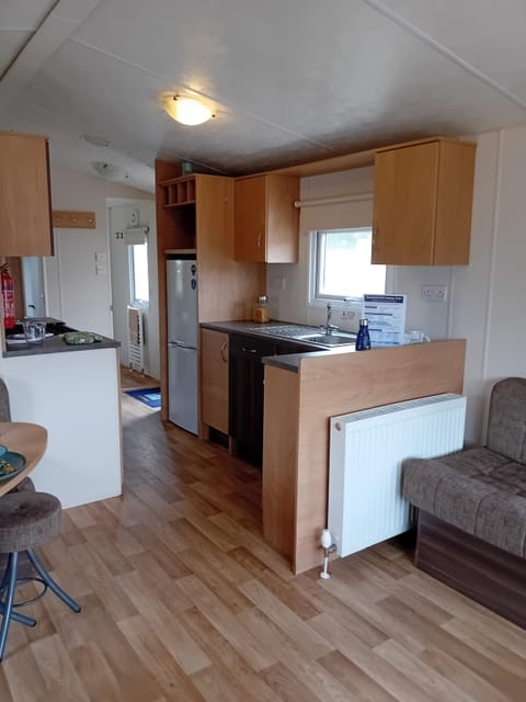 Cozy kitchen and dining area with warm wood accents