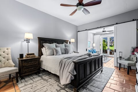 Master bedroom with king bed, large closet