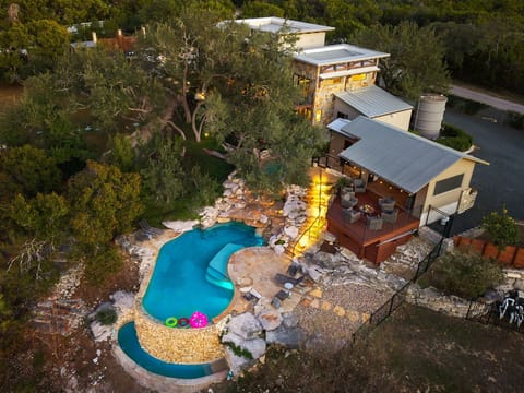 A stunning aerial view of Lariat Springs at dusk. Enjoy our pool and hot tub!