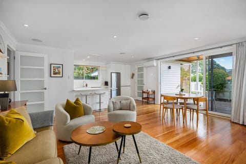 Open plan living with fully equipped kitchen, dining and lounge area, all opening out to the deck and lawn