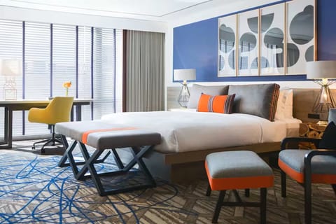 Sink into plush bedding and enjoy a serene, stylish retreat.