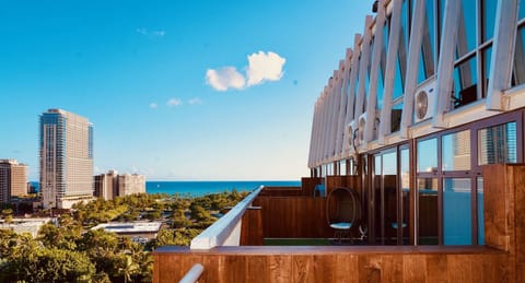 High floor outdoor deck with ocean and skyline views