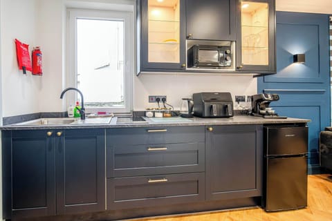 The kitchen has everything you could possibly need for your stay, including utensils, kettle, toaster, fridge, microwave and hob. Please note there is no oven.