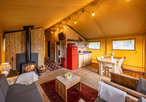 Open-plan kitchen, dining and sitting area, glamping in Yorkshire
