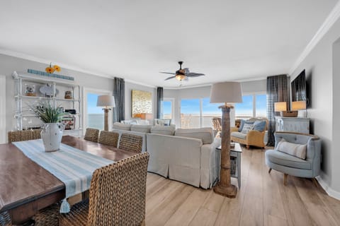 Well appointed dining and living room! Beach views all around in Stella Blue