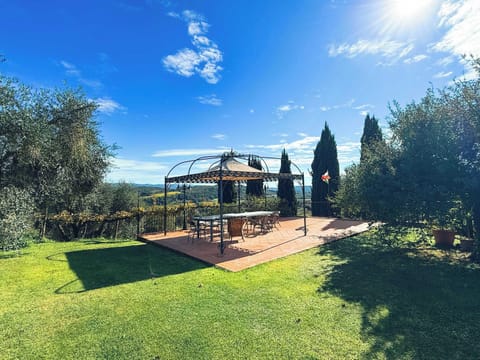 Outdoor Dinning space with Tuscan hillside views