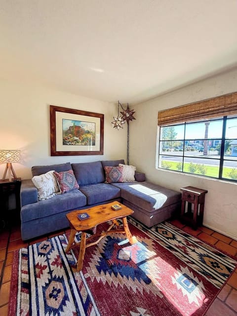 Step into our bright and welcoming living space, where comfort meets Southwestern charm! This area is designed for relaxation after a day of exploring.