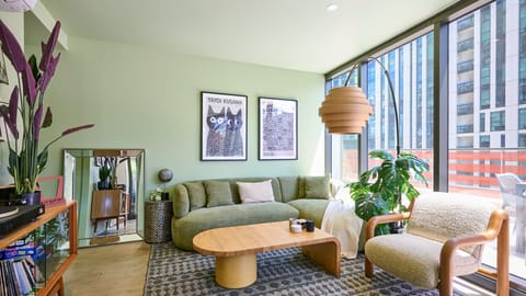 Bright, stylish living room with modern décor and large windows for natural light.