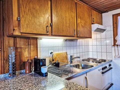 Kitchen, Wood, Countertop, Interior Design, Flooring, Major Appliance, Floor, Ceiling, Sink, Kitchen Appliance