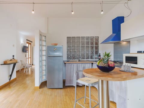 Flooring, Furniture, Interior Design, Wood, Ceiling, Floor, Kitchen, Kitchen Appliance, Major Appliance, Lighting