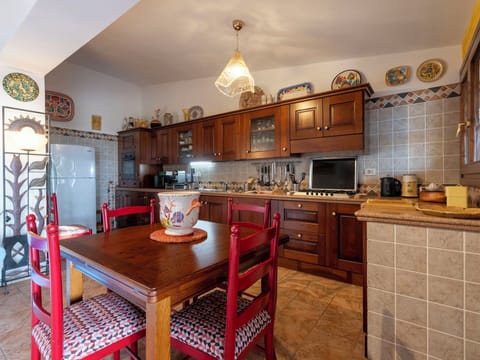 Furniture, Kitchen, Interior Design, Cabinetry, Flooring, Countertop, Wood, Room, Kitchen Appliance, Floor