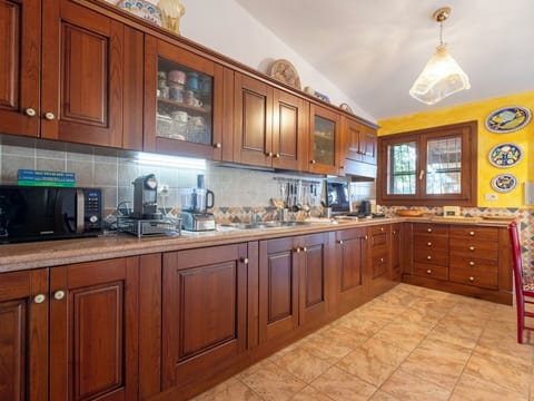 Kitchen, Cabinetry, Furniture, Countertop, Wood, Interior Design, Flooring, Kitchen Appliance, Major Appliance, Cupboard