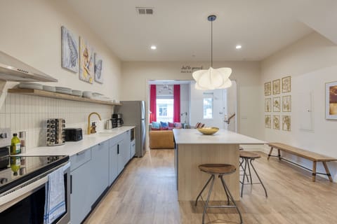 Share late-night laughs around the stylish kitchen island. (A101, A103)