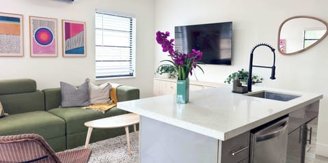 Great for hosting—prep drinks, plate dinner, and stay connected with everyone in the living space.