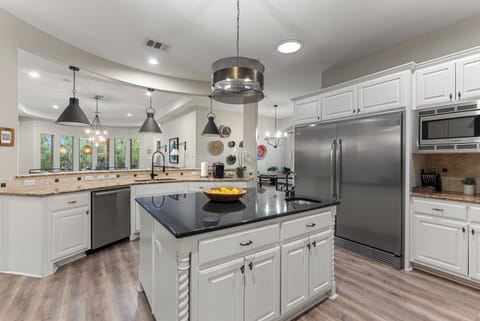 Gather around the island for food, drinks and laughs